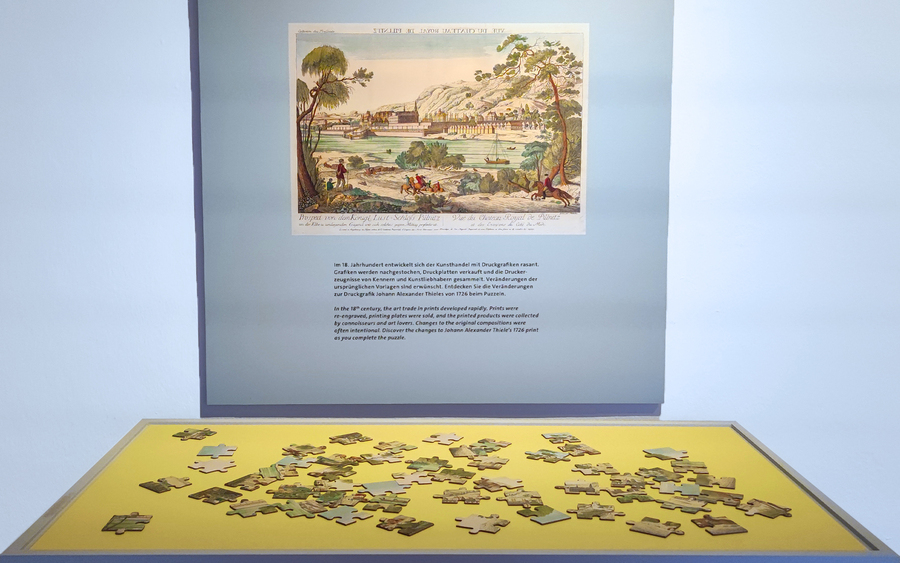 Es darf gepuzzelt werden. Foto. Staatliche Schlösser, Burgen und Gärten Sachsen gemeinnützige GmbH